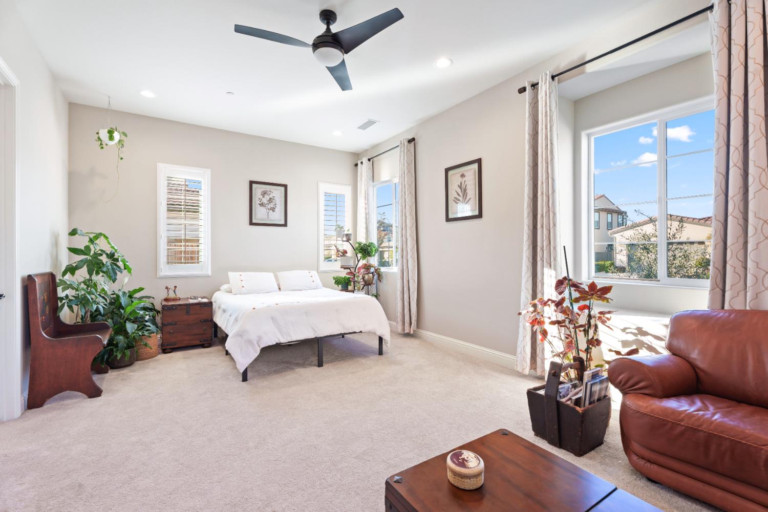 822 Overstone Avenue Madera, CA 93636 - Photo 14 of 49 a spacious bedroom with a bed and furniture