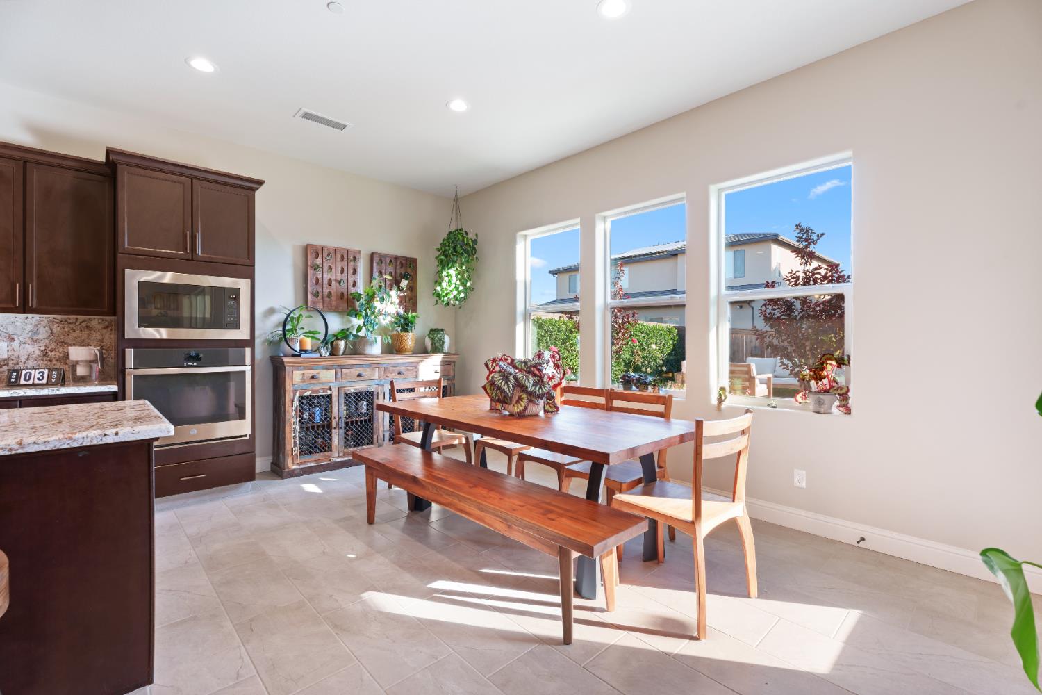 822 Overstone Avenue Madera, CA 93636 - Photo 44 of 49 a view of a dining room with furniture window and outside view