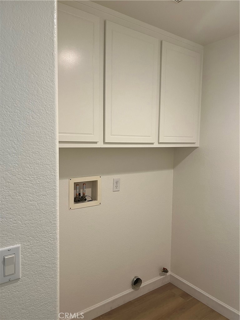 12772 Clemson Drive Eastvale, CA 92880 - Photo 12 of 28 a view of small space with wooden floor