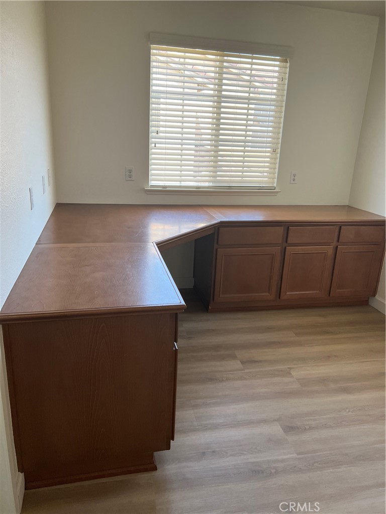 12772 Clemson Drive Eastvale, CA 92880 - Photo 21 of 28 a view of a room with wooden floor and a window