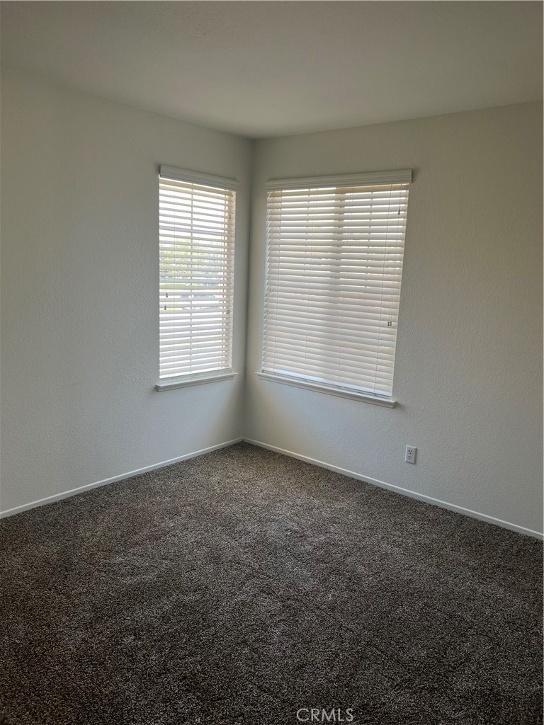 12772 Clemson Drive Eastvale, CA 92880 - Photo 23 of 28 an empty room with a window