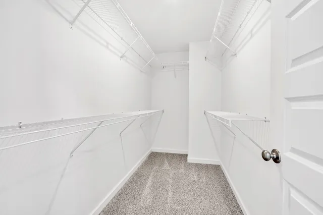 a bathroom with a sink double vanity and a mirror