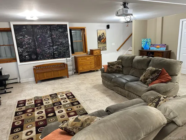 a living room with furniture and a couch