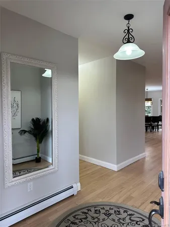a view of a hallway view with staircase