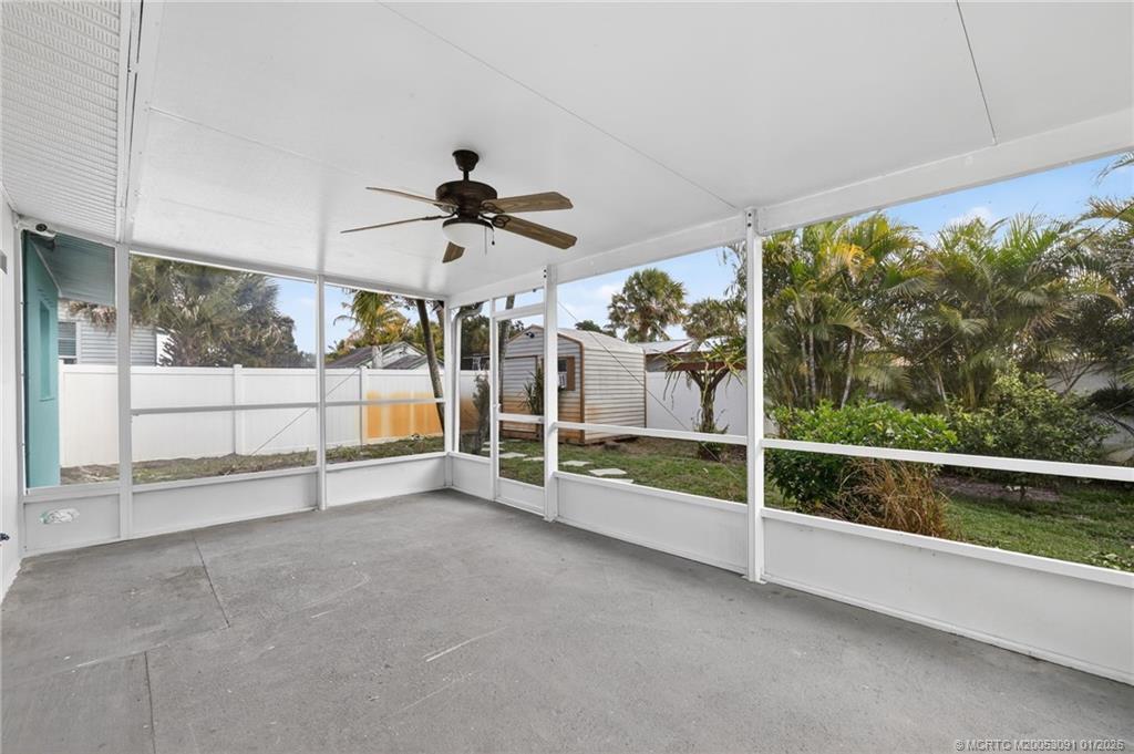 607 Southeast Cortez Avenue Stuart, FL 34994 - Photo 16 of 29 a view of room with a ceiling fan