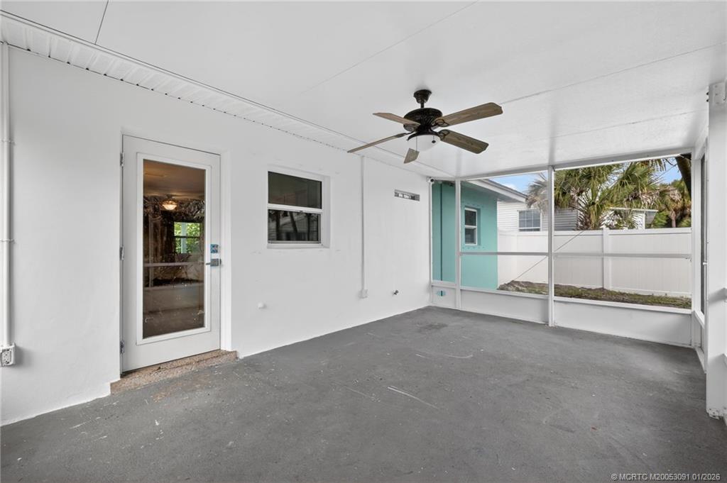 607 Southeast Cortez Avenue Stuart, FL 34994 - Photo 23 of 29 a view of an empty room with a window