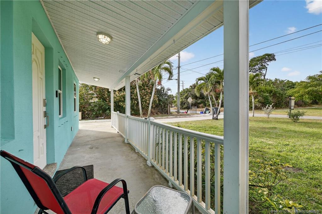 607 Southeast Cortez Avenue Stuart, FL 34994 - Photo 28 of 29 a view of a porch