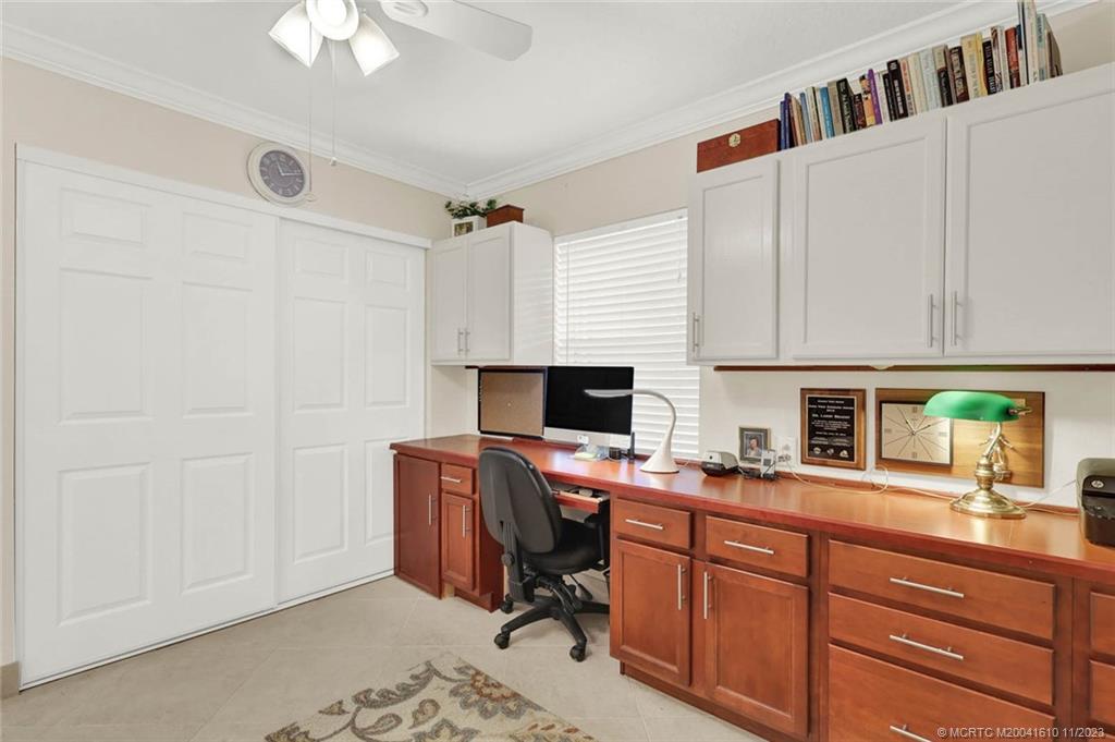 1950 Southwest Palm City Road, Unit 4107 Stuart, FL 34994 - Photo 35 of 65 a view of a workspace with furniture