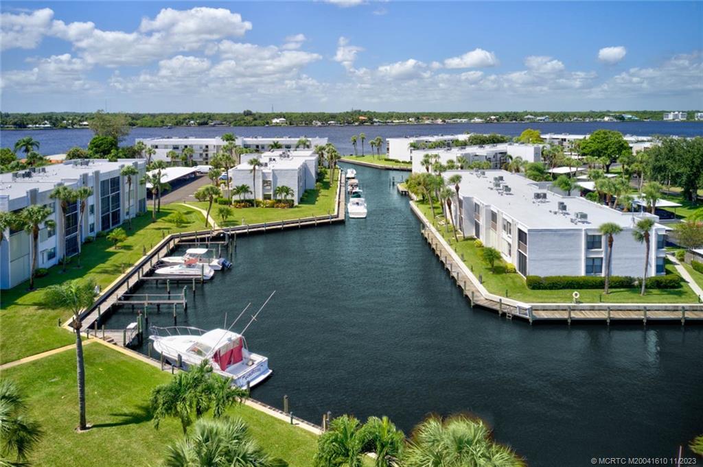 1950 Southwest Palm City Road, Unit 4107 Stuart, FL 34994 - Photo 64 of 65 a view of a house with a lake view