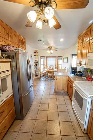 a kitchen that has a lot of cabinets