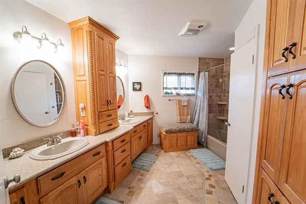 a bathroom with a shower and a shower