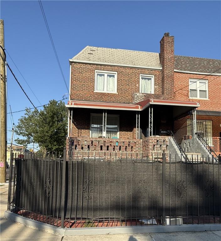 a front view of a house with garage