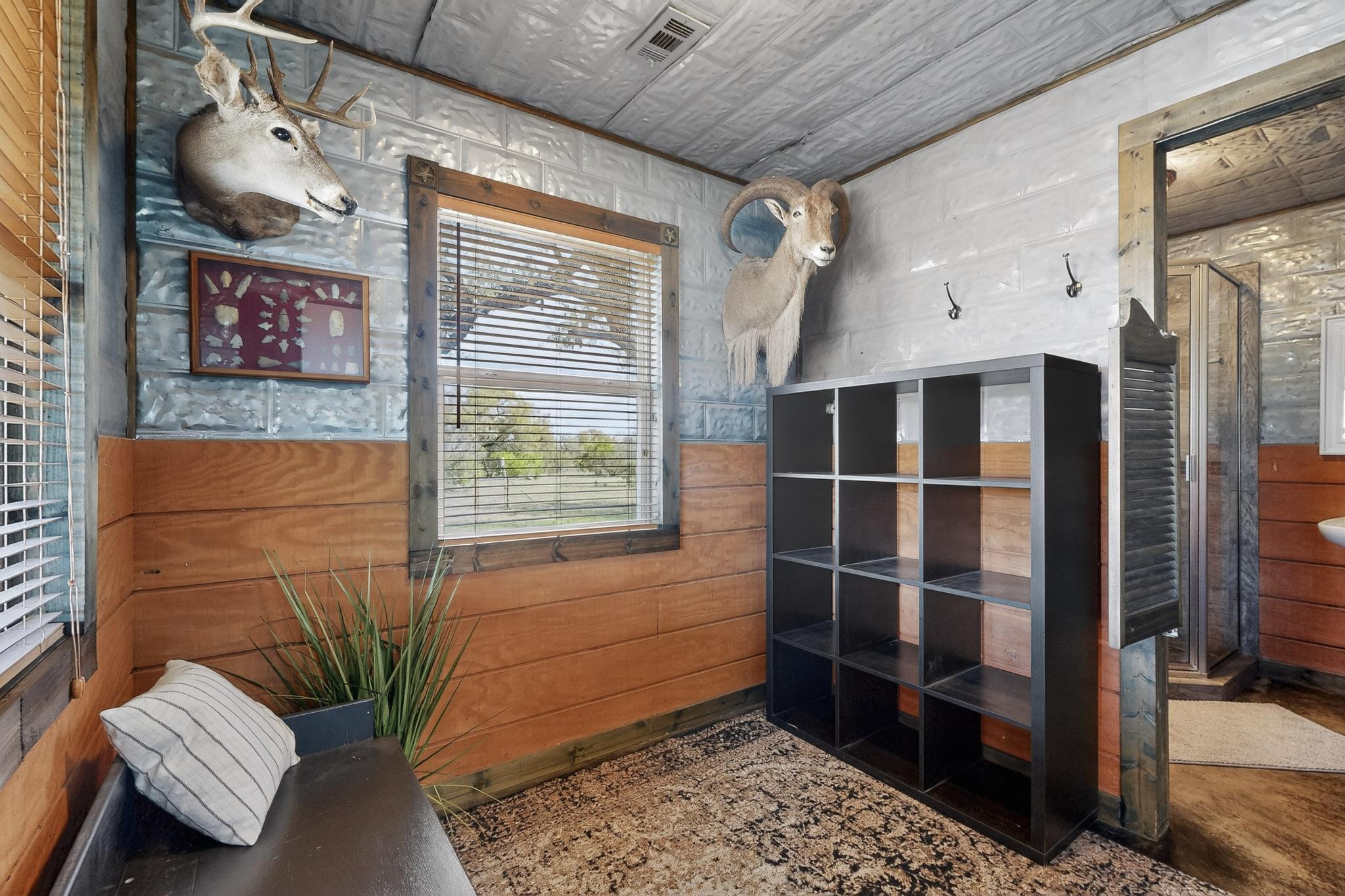 1619 Althaus Ranch Road Johnson City, TX 78636 - Photo 19 of 37 Area between second living and second bath. Can be reconfigured into addtional bedroom.