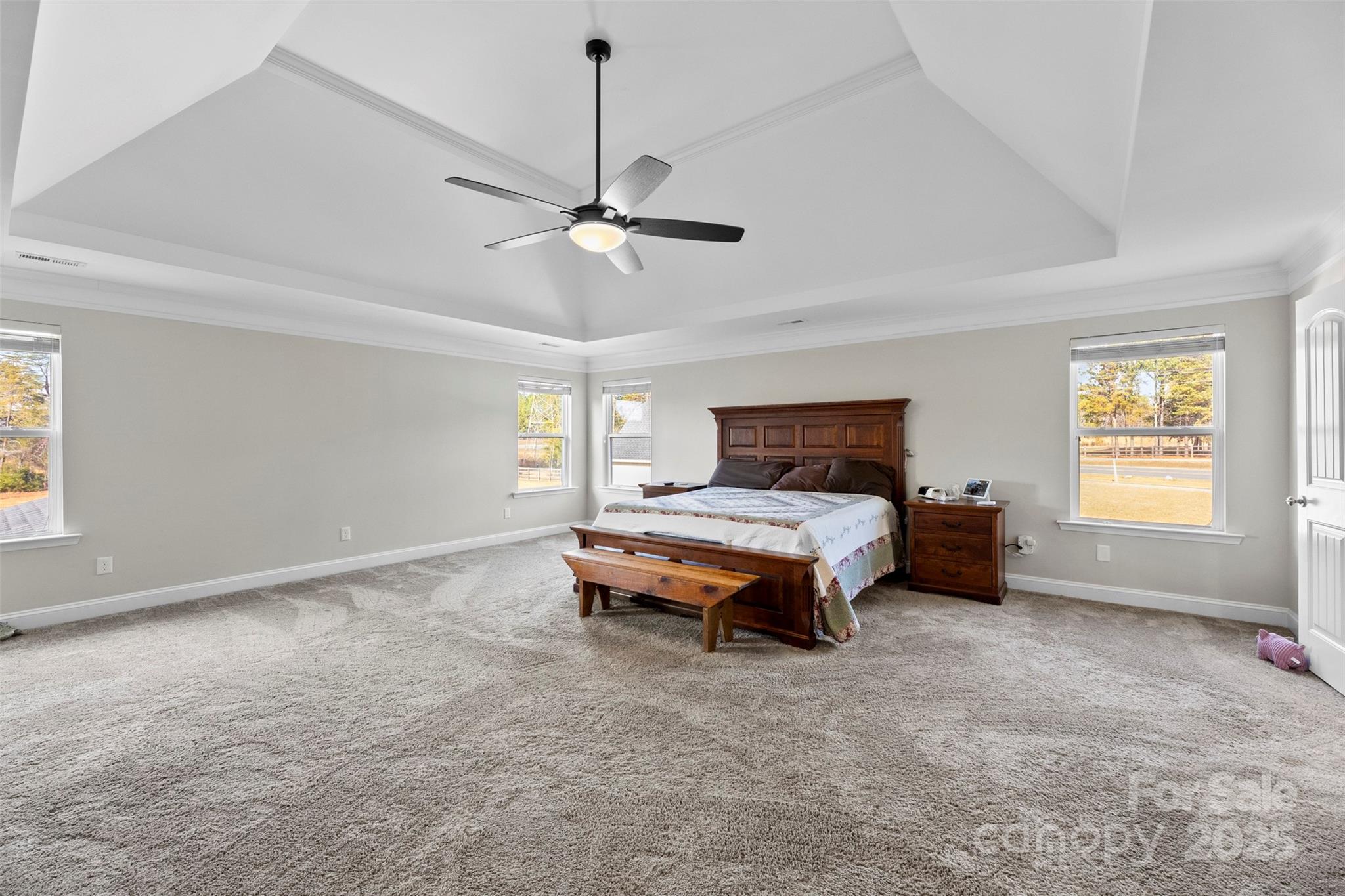 164 Reese Wilson Road Belmont, NC 28012 - Photo 13 of 27 a bedroom with a bed and a ceiling fan