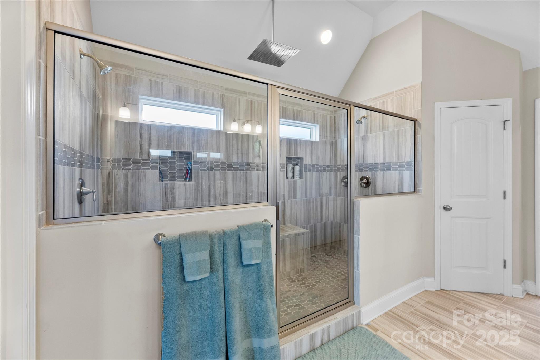 164 Reese Wilson Road Belmont, NC 28012 - Photo 15 of 27 a bathroom with a glass shower door