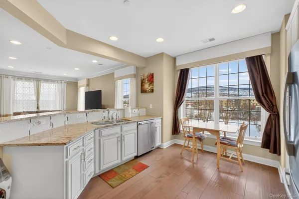 a bedroom with a bed and couch