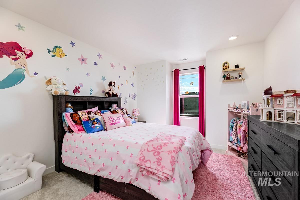 4469 South Colditz Way Meridian, ID 83642 - Photo 20 of 30 Room featuring white walls and a single window with dark pink curtains
