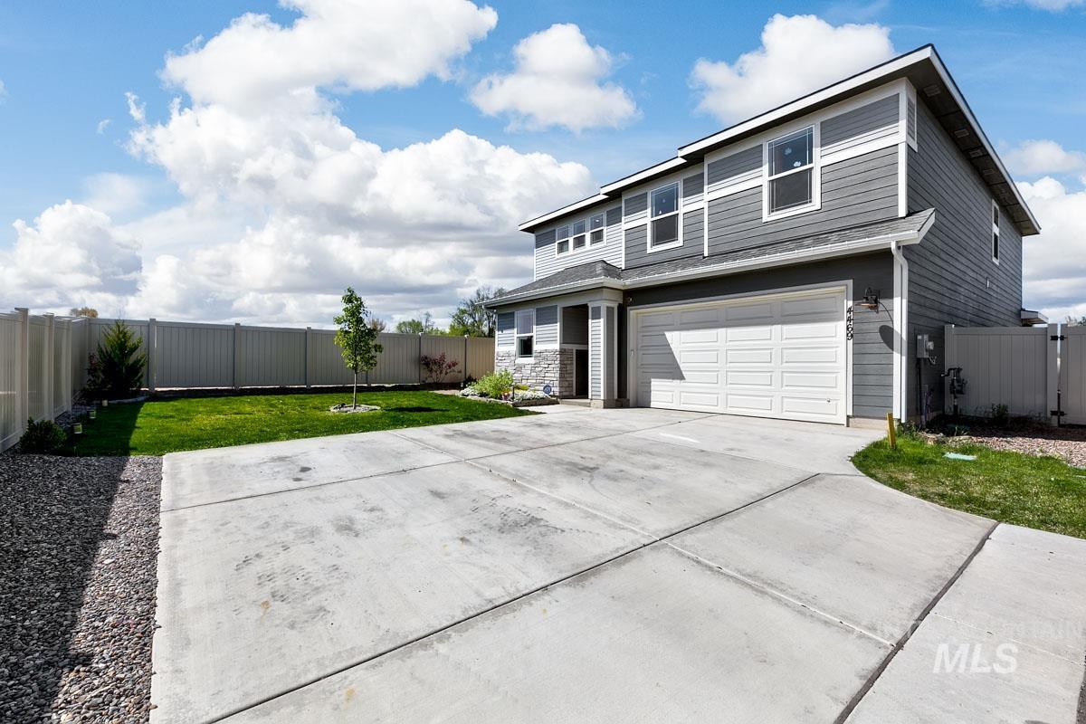 4469 South Colditz Way Meridian, ID 83642 - Photo 30 of 30 Contemporary two-story residence featuring grey horizontal siding and white trim