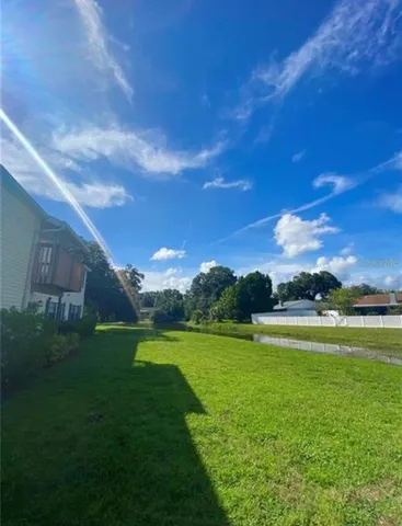 a balcony with wooden floor