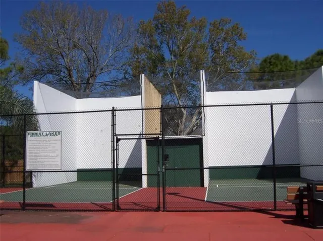 a view of a chairs and table in the patio