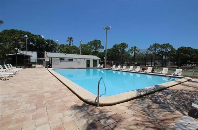 a bedroom with a bed and a walk in closet