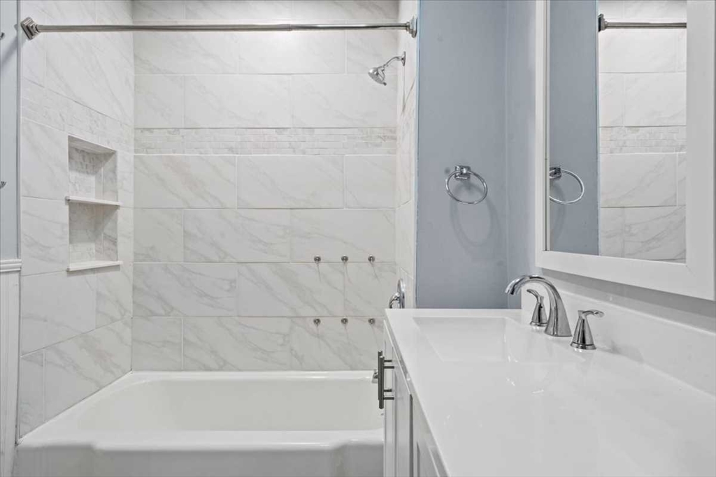 131 South Main Street Clinton, MA 01510 - Photo 20 of 36 a bathroom with a shower and a sink