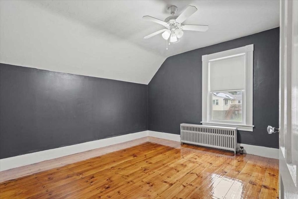 131 South Main Street Clinton, MA 01510 - Photo 27 of 36 wooden floor in an empty room with a window
