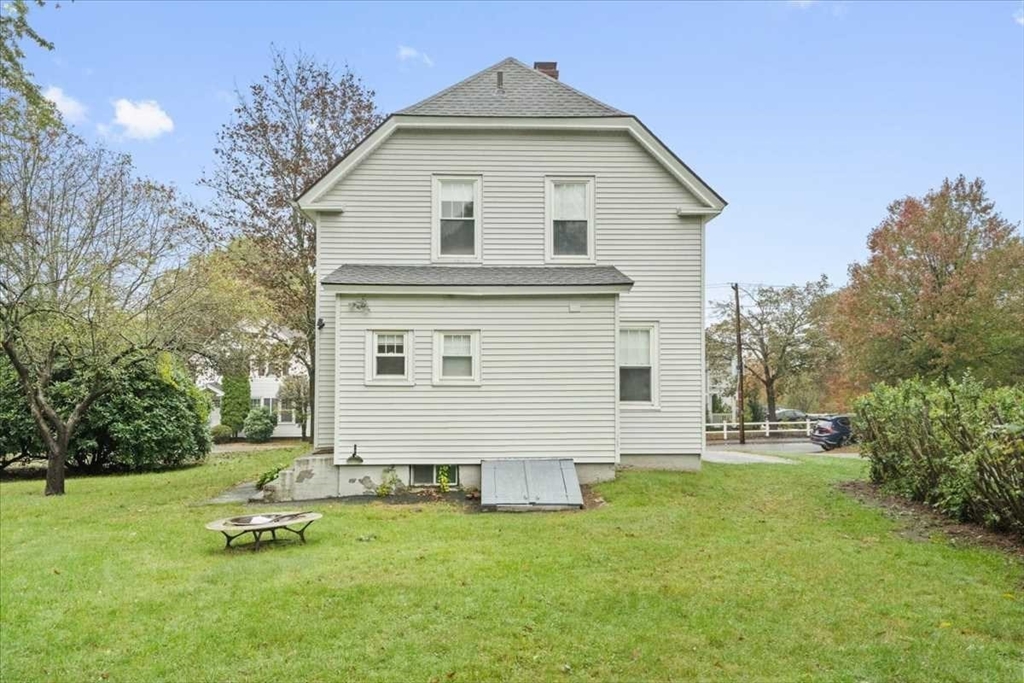 131 South Main Street Clinton, MA 01510 - Photo 33 of 36 a front view of a house with a yard