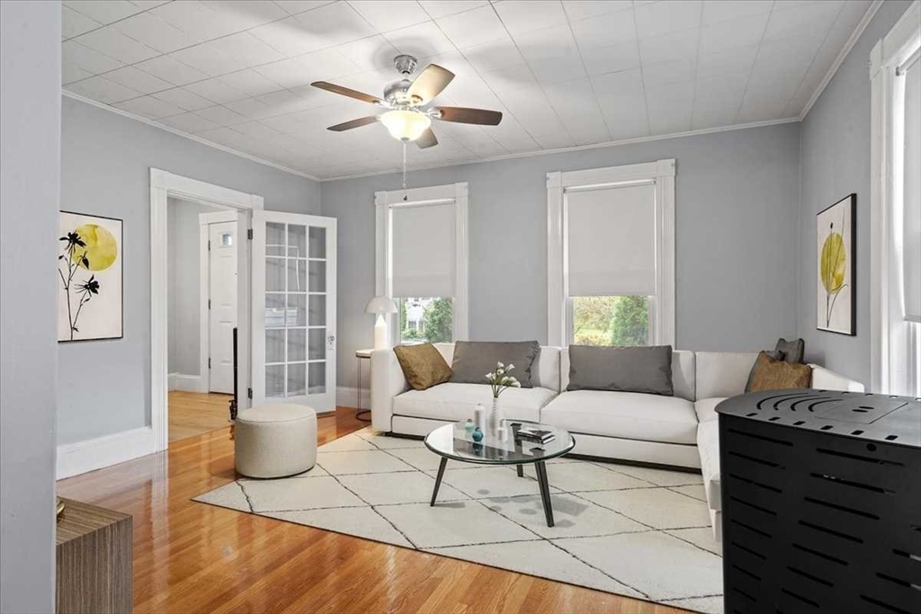 131 South Main Street Clinton, MA 01510 - Photo 6 of 36 a living room with furniture and a chandelier