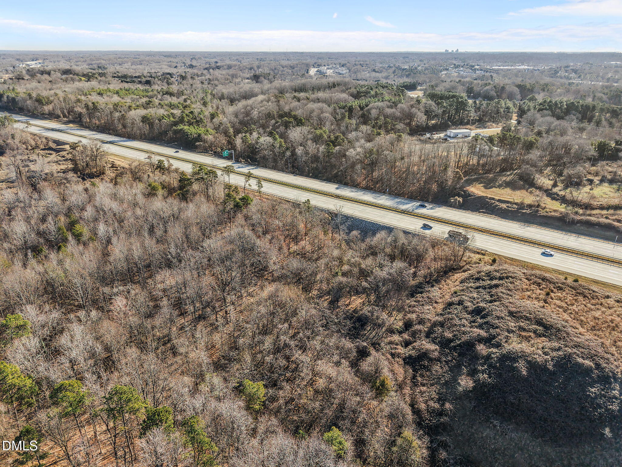 3514 Lewiston Road Greensboro, NC 27410 - Photo 2 of 17 a view of a mountain from a yard