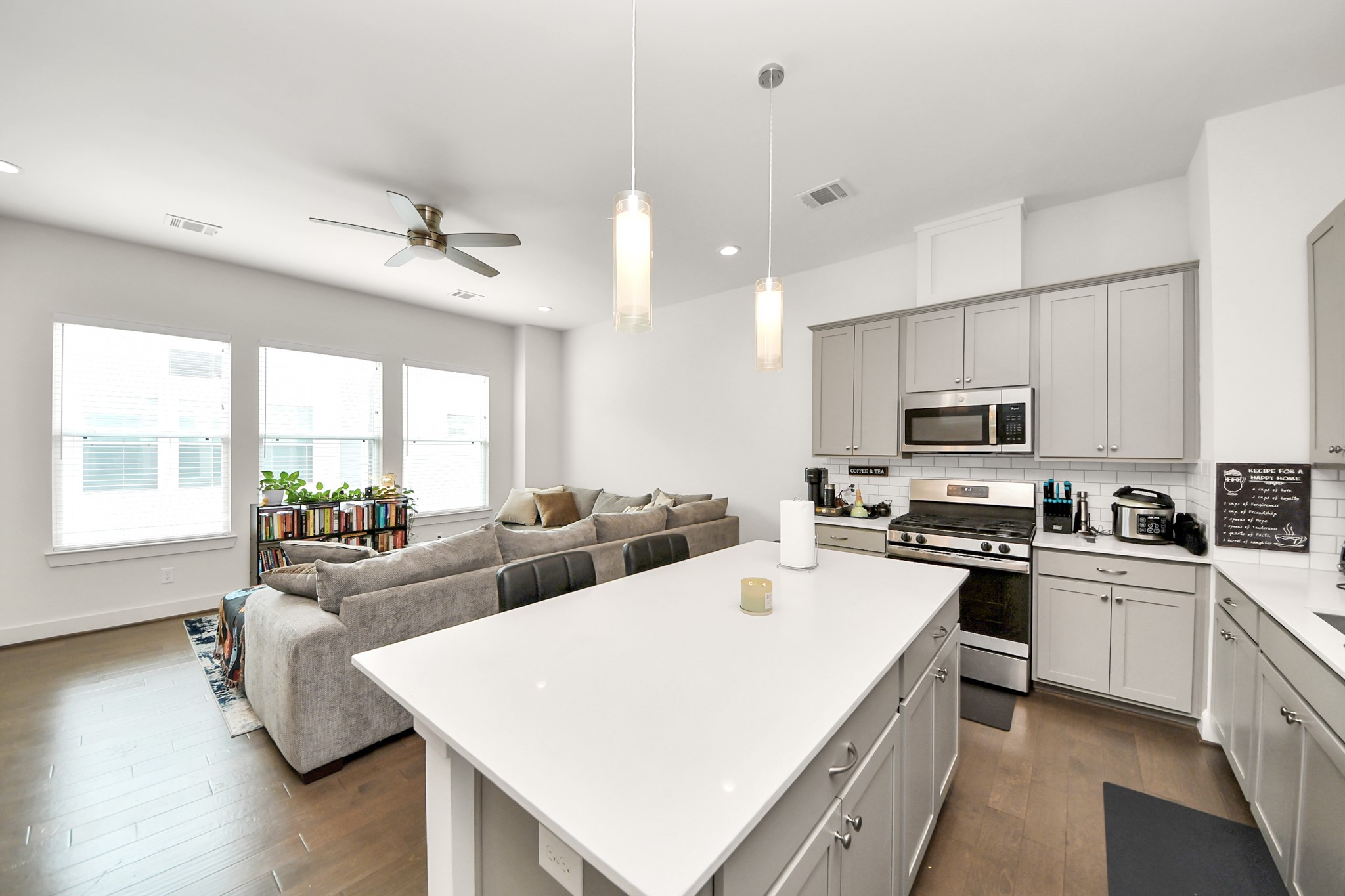 3622 Griggs Road Houston, TX 77021 - Photo 22 of 30 a large white kitchen with stainless steel appliances