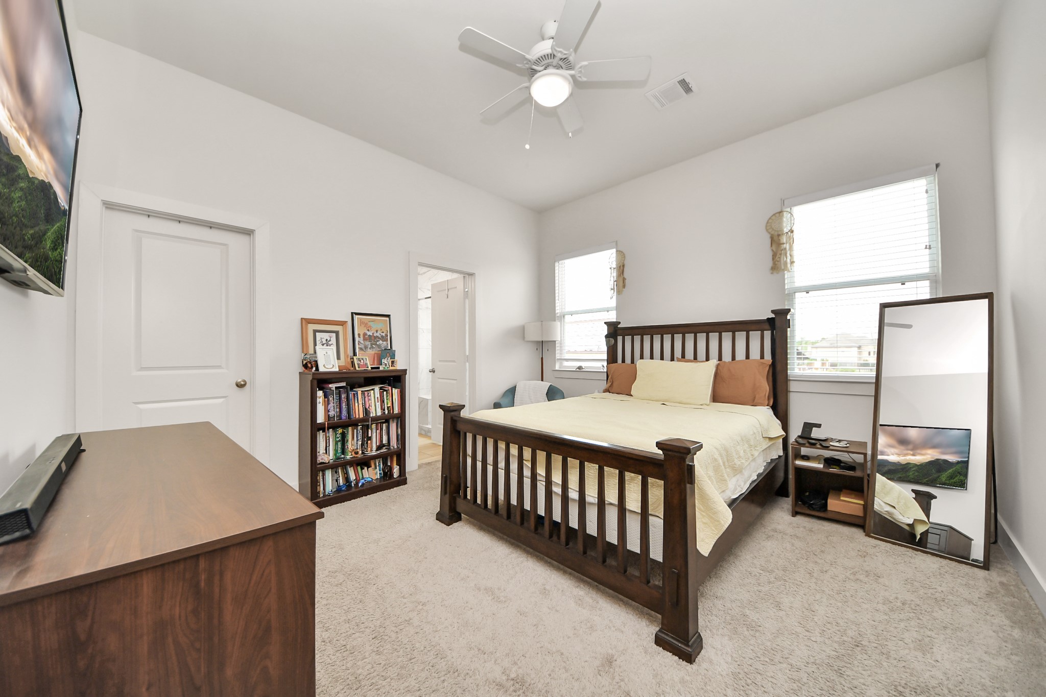 3622 Griggs Road Houston, TX 77021 - Photo 23 of 30 a bedroom with a bed and a cabinets