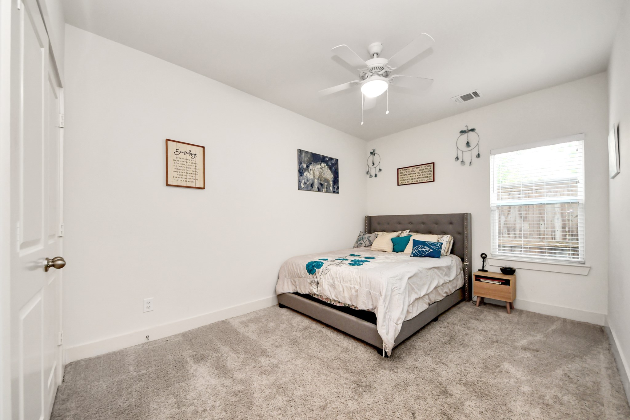 3622 Griggs Road Houston, TX 77021 - Photo 6 of 30 a bedroom with a bed lamp and a window
