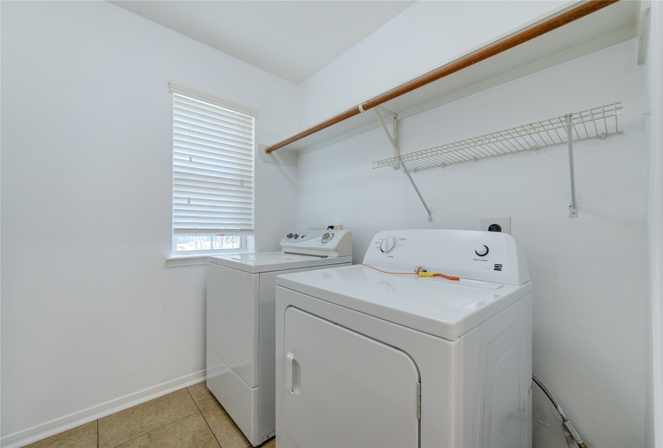 14315 Acorn Ridge Way Cypress, TX 77429 - Photo 12 of 22 a utility room with dryer and washer