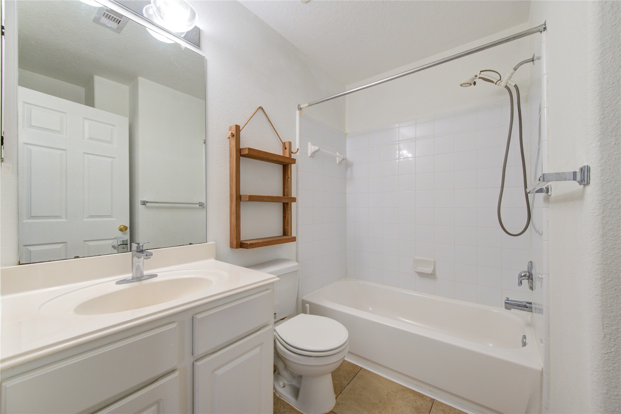14315 Acorn Ridge Way Cypress, TX 77429 - Photo 19 of 22 a bathroom with a sink a toilet and shower