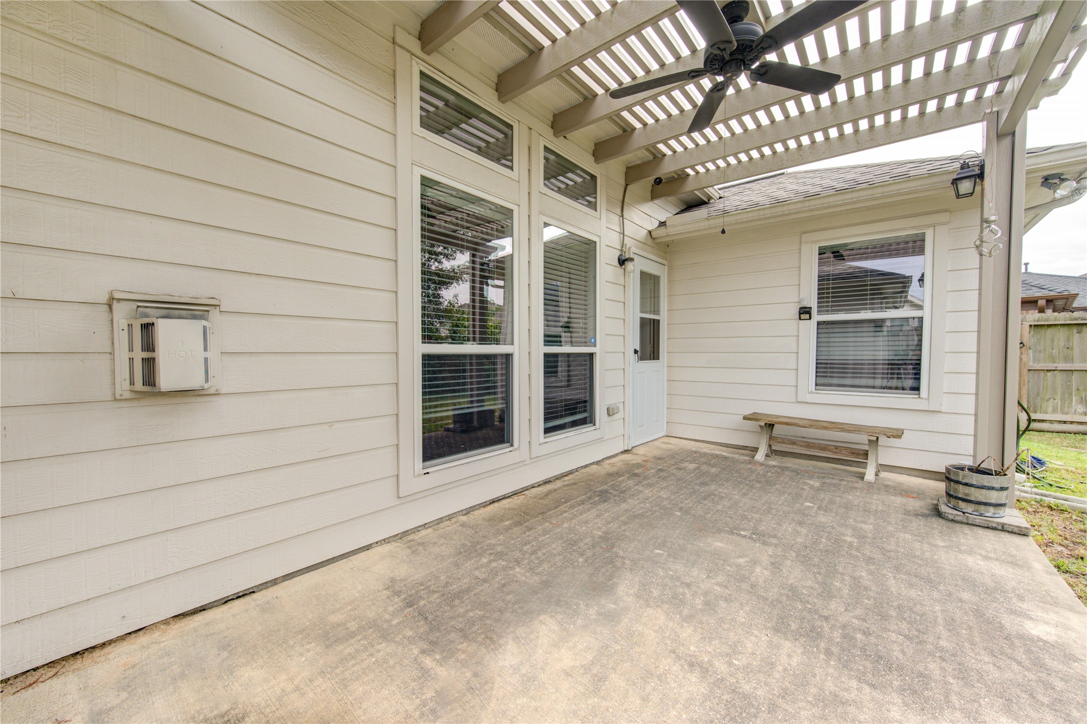 14315 Acorn Ridge Way Cypress, TX 77429 - Photo 22 of 22 a view of a porch with a table and chairs