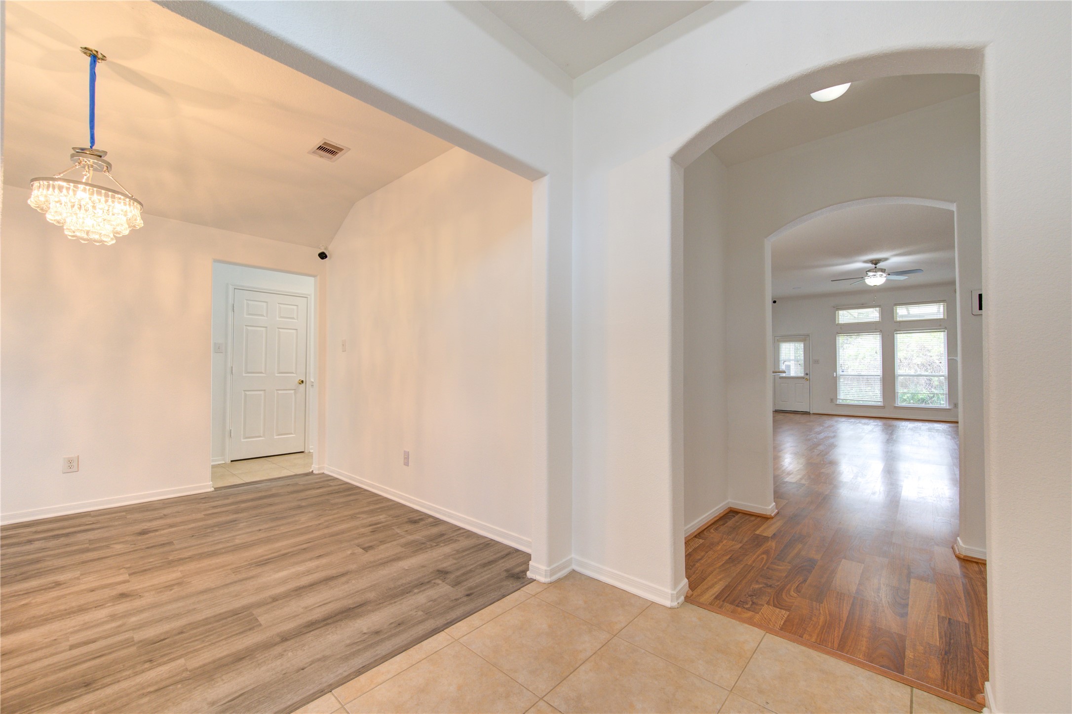 14315 Acorn Ridge Way Cypress, TX 77429 - Photo 4 of 22 wooden floor in an empty room with a window