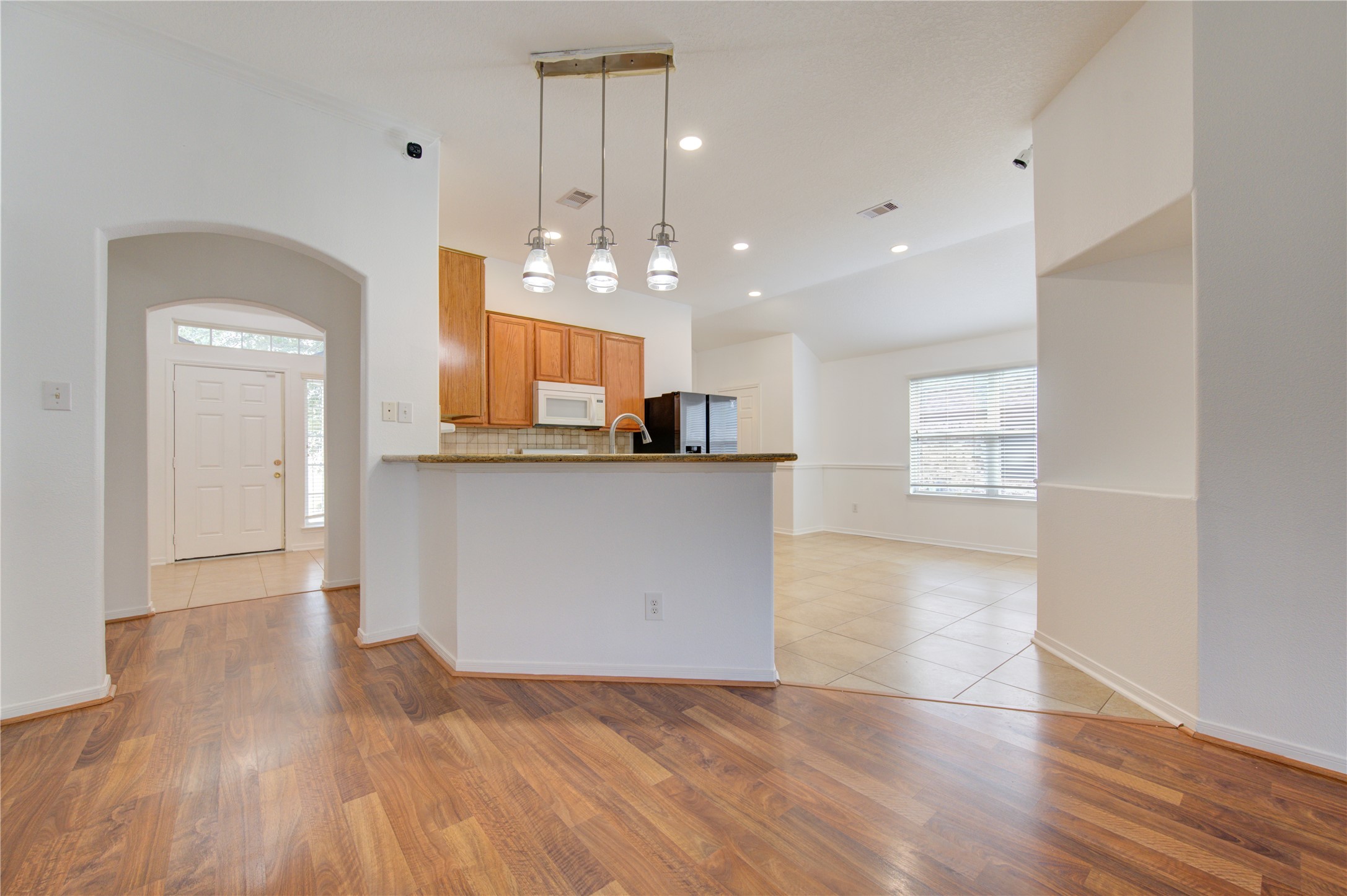 14315 Acorn Ridge Way Cypress, TX 77429 - Photo 6 of 22 a view of a kitchen and a window