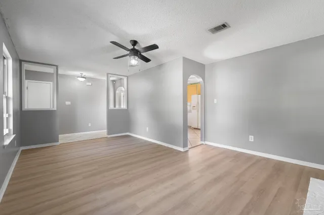 a view of fireplace and wooden floor