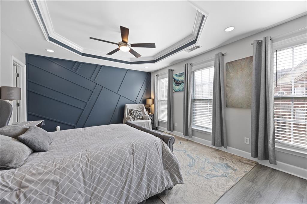 2871 Overlook Way Atlanta, GA 30324 - Photo 13 of 32 a bedroom with a bed next to a window