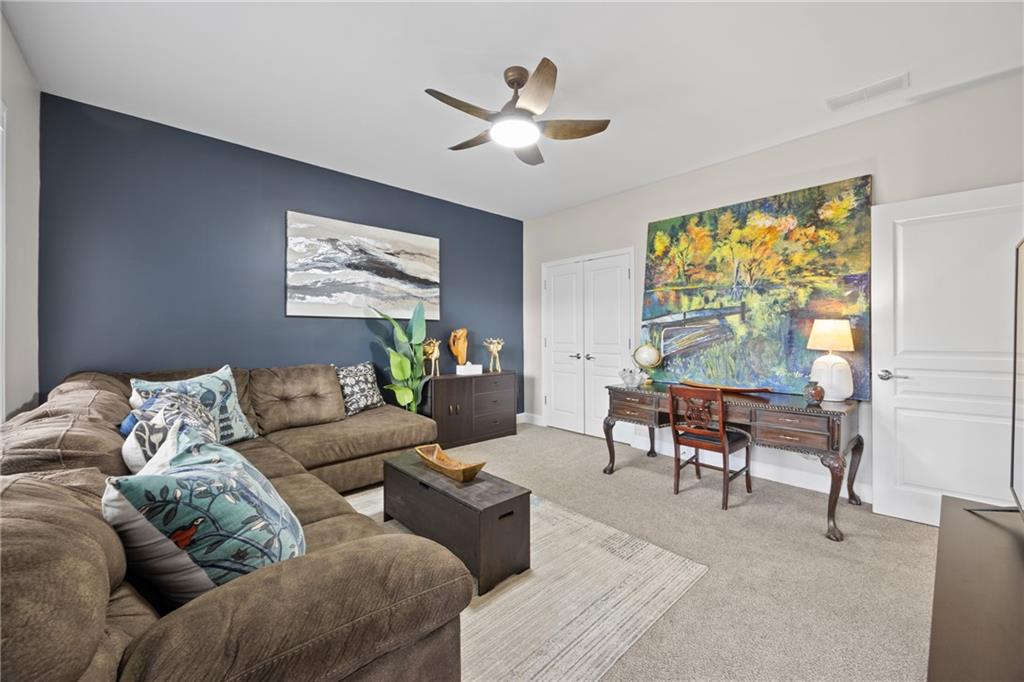 2871 Overlook Way Atlanta, GA 30324 - Photo 20 of 32 a living room with furniture and a large window