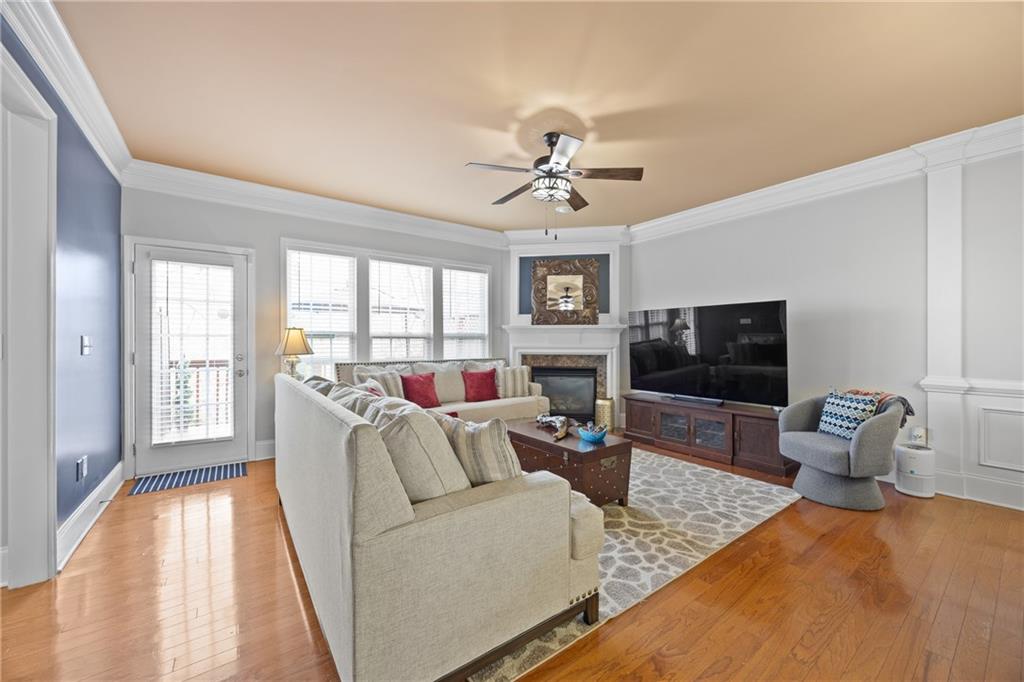 2871 Overlook Way Atlanta, GA 30324 - Photo 5 of 32 a living room with furniture and a flat screen tv