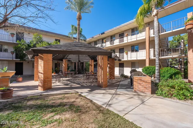 a front view of a building with street view