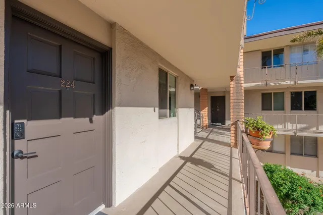 a view of a house with barbeque and stove