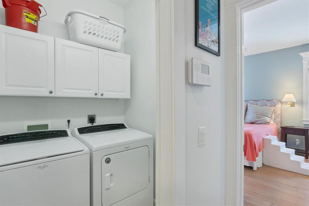250 Wheeler Road Boca Grande, FL 33921 - Photo 21 of 34 a view of storage and utility room with washer and dryer