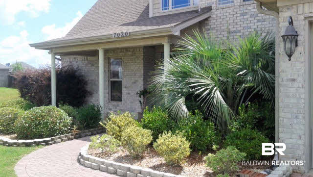 7020 Rocky Rd Loop Gulf Shores, AL 36542 - Photo 2 of 29 Incredible landscaping