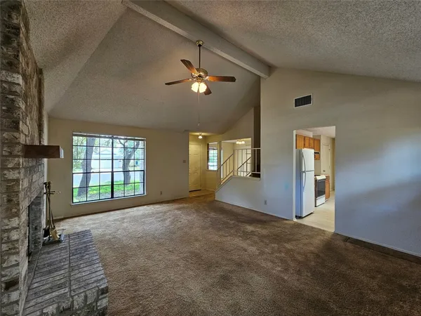 a view of a livingroom with a fireplace
