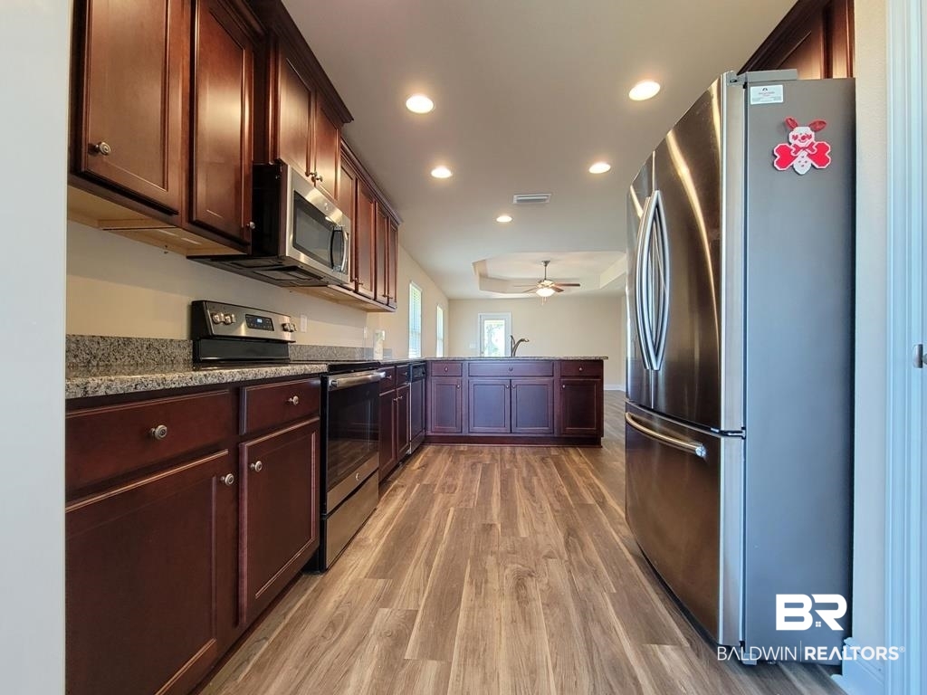 22465 Respite Lane Foley, AL 36535 - Photo 4 of 33 All Appliances convey; refrigerator 3 years old.