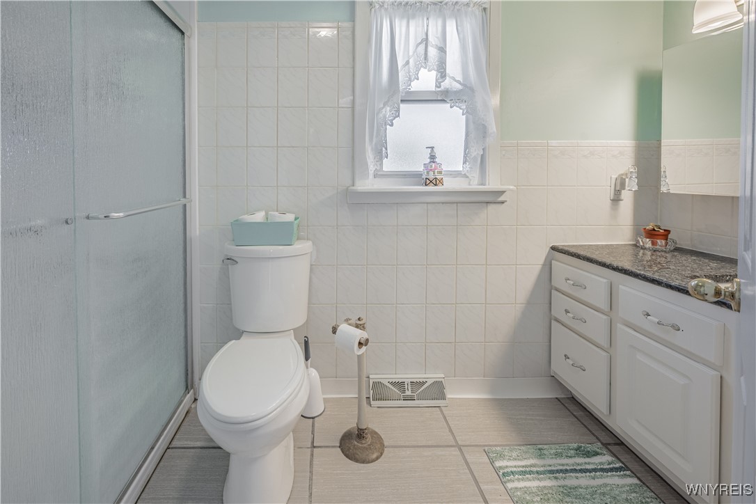 18 Louise Drive Cheektowaga, NY 14227 - Photo 23 of 41 Walk in shower in the second floor bathroom room.