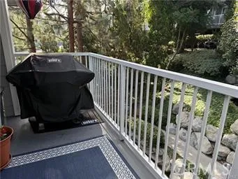 a view of balcony with a floor to ceiling window and stairs